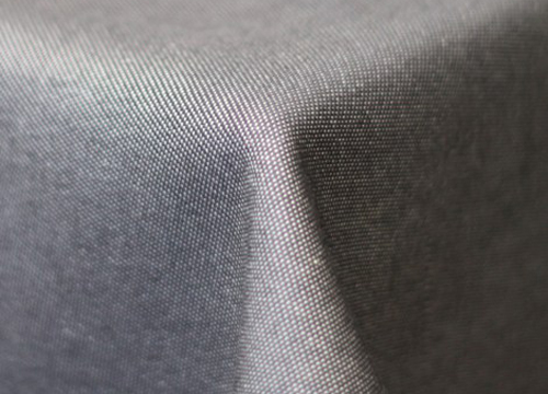 Close-up van een grijs tafelkleed