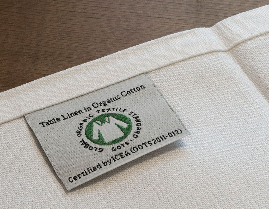 Label van GOTS-gecertificeerd tafellinnen van biologisch katoen